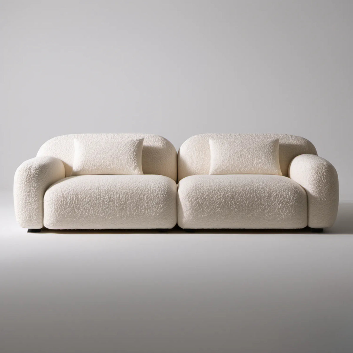 Kremowa sofa 2-osobowa bouclé z zaokrąglonymi podłokietnikami 220 x 95 x 75 cm
